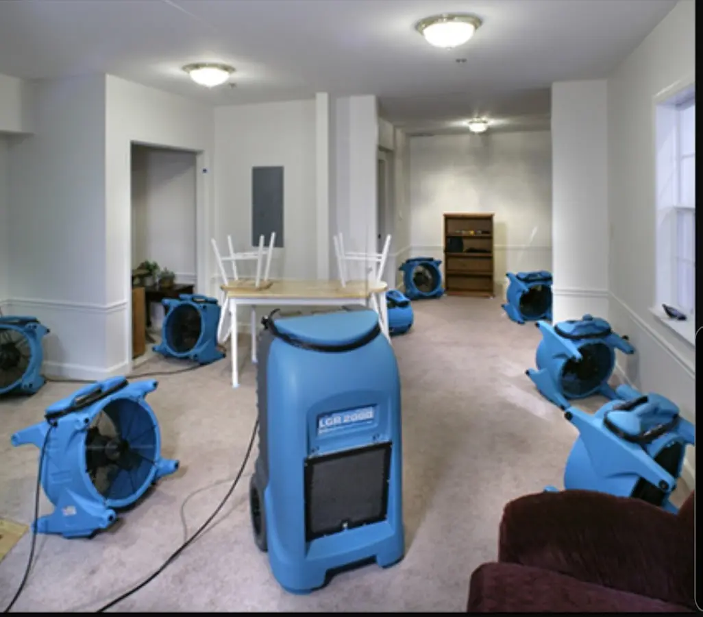 Air movers and dehumidifier setup for Water Damage Restoration in Castle Pines